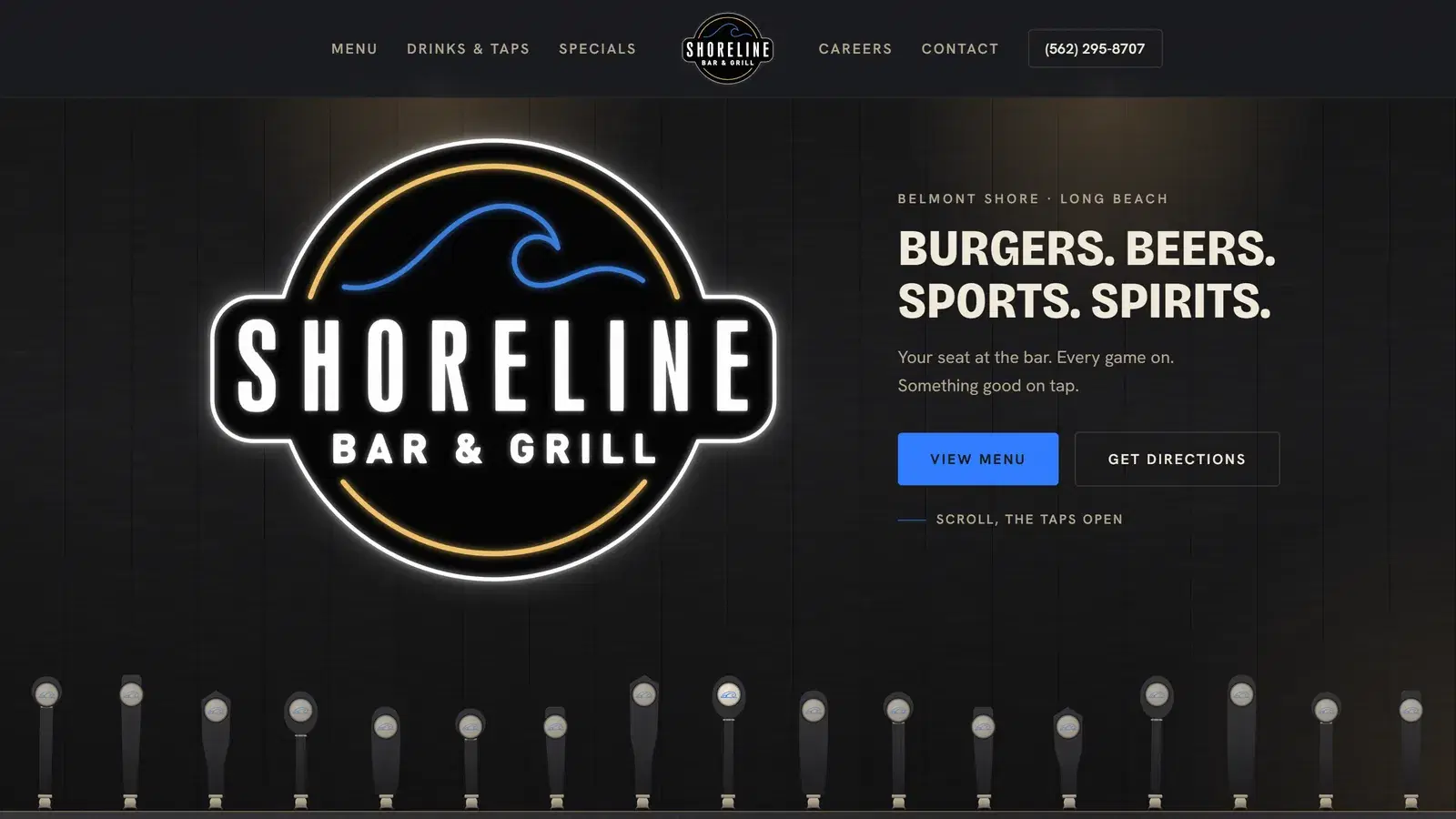 Shoreline Bar & Grill homepage: the neon Shoreline sign beside “Burgers. Beers. Sports. Spirits.” with a row of tap handles below
